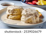 Biscuits and Gravy: Fluffy, buttery biscuits smothered in creamy sausage gravy, providing a hearty and comforting breakfast.