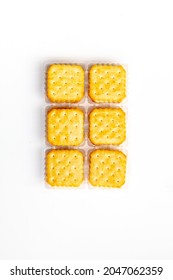 BISCUITS - A Square Biscuits Puff Sandwich Lemon Flavoured Cream Isolated On White