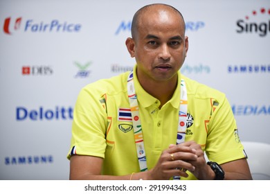 BISHAN,SINGAPORE-JUNE1:Head Coach Choketawee Promrut Of Thailand Speaks During A Press Conference At Bishan Stadium On JUNE1 2015 In,SINGAPORE.