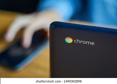 Bishkek, Kyrgyzstan - June 6, 2019: Asus Chromebook. Man working laptop connecting networking concept