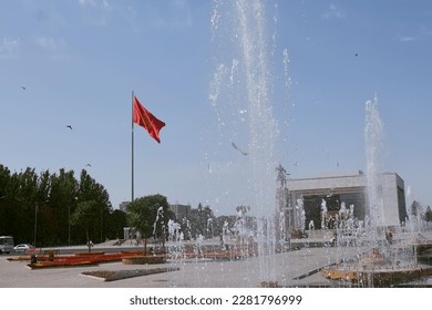 Bishkek, Kyrgyzstan, Main square, government building, fountain, people - Powered by Shutterstock