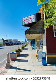 Bishop, CA - September 19, 2021: Empty Street With Amigos Mexican Restaurant On The Corner Of Main St.