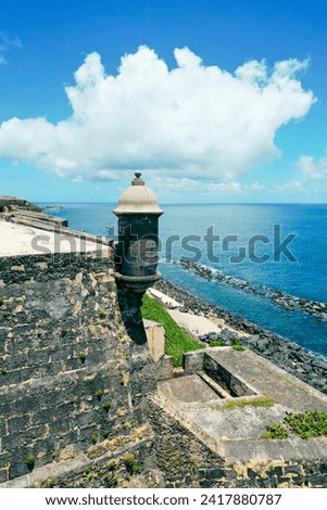 Bishop Tower, sentinel of history, stands proud at El Morro Fort, overseeing the endless expanse of the Puerto Rican ocean.