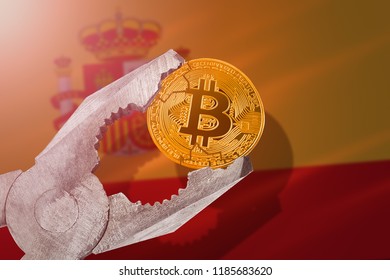 bitcoin (BTC) coin being squeezed in vice on Spain flag background; concept of cryptocurrency bitcoin under pressure. Prohibition of cryptocurrencies, regulations, restrictions or security