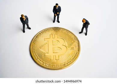 Bitcoin (BTC) Coin And Businessmans. Digital Cyber Safety Or Security Encryption. Manage Bitcoin Price Schedule Concept. Money Laundering Bitcoin Concept. Market Manipulation.