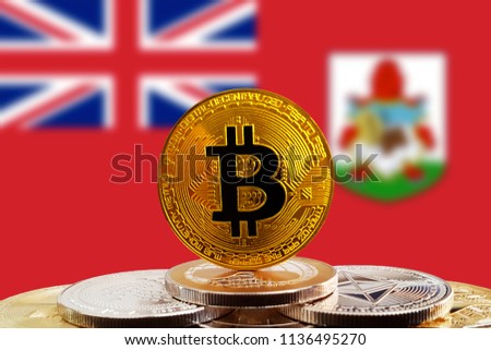 Bitcoin BTC on stack of cryptocurrencies with Bermuda flag in background. The cryptocurrency coin is golden and in focus