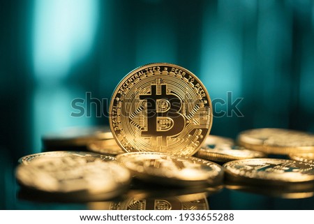 Bitcoin BTC virtual cryptocurrency in front of abstract digital background
