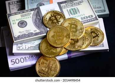 Bitcoin with cash pile, digital virtual crypto currency bitcoin and paper money stacks. Euro and US dollar bills and gold bit coins (btc). Concept of bitcoin online payment, business, stock and wealth