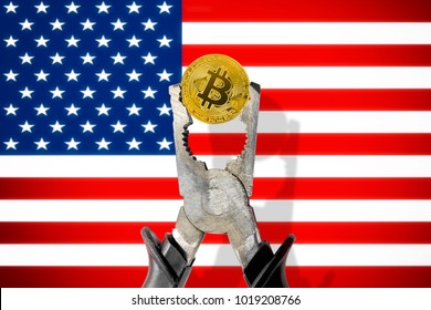 BITCOIN Coin Being Squeezed In Vice On The United States (USA) Flag Background; Concept Of Cryptocurrency Bitcoin Under Pressure. Prohibition Of Cryptocurrencies, Regulations, Restrictions Or Security