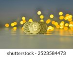 
bitcoin, coin, cryptocurrency, gold coin, golden bitcoin, crypt, background, bokeh, gift, coin in hand, hand