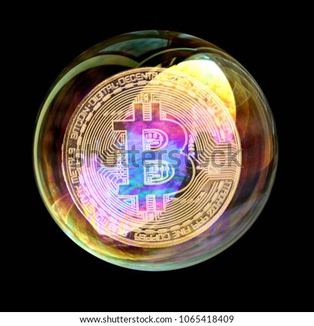 Bitcoin coin in a soap bubble. Concept of instability of the crypto currency over black background.