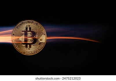 A bitcoin coin in the tongues of a hot flame. Real photo