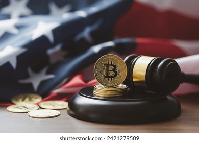 Bitcoin Crypto Regulation And Law.Cryptocurrency laws. gavel and bitcoins with the United States of America flag on the table.Cryptocurrency Legislation and Cryptocurrency Tax Laws.Cryptocurrency ETF - Powered by Shutterstock