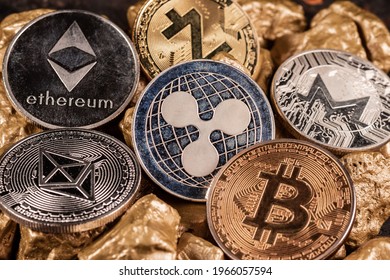 Bitcoin cryptocurrency and altcoins with gold nuggets. Investment and store of value concept.
