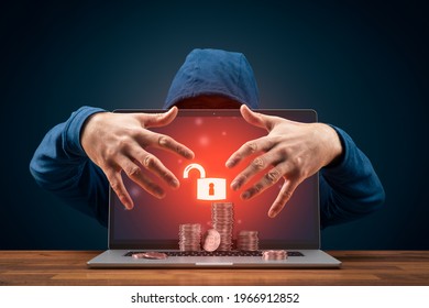 Bitcoin and cryptocurrency cybersecurity concept with hacker behind the unsecured laptop. - Powered by Shutterstock