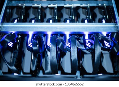 Bitcoin and cryptocurrency miner - a mining computer. Close-up on several GPU