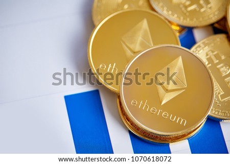 Bitcoin cryptocurrency on the chart background, close-up, shallow depth of field