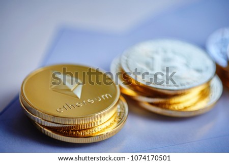 Bitcoin cryptocurrency on the chart background, close-up, shallow depth of field