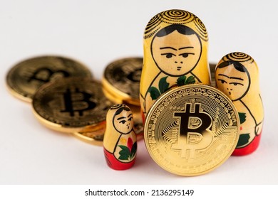 Bitcoin Cryptocurrency with Wooden Russian national doll Babushka Matryoshka. Bitcoin Cryptocurrency Russia Ruble Exchange money USD Dollar BTC Gold 