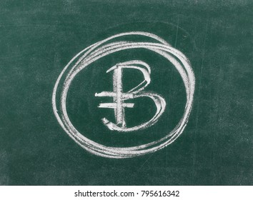 Bitcoin currency symbol on chalkboard, blackboard background, texture