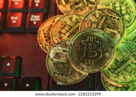 Bitcoin - Downtrend red sight of Crypto currency close up of Bitcoin coins isolated on stock market background. Blockchain technology, bitcoin mining 