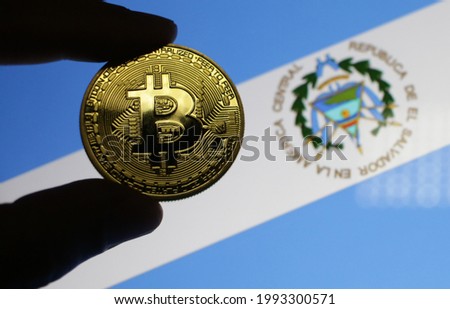 Bitcoin with El Salvador flag background selective focus at the coin 