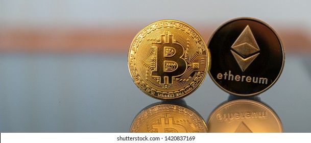 Bitcoin Ethereum Coin In A Line On A Mirror