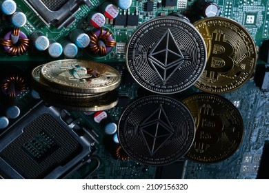 Bitcoin and Ethereum Cryptocurrency Coins with electronic components. Virtual Money on black reflective background