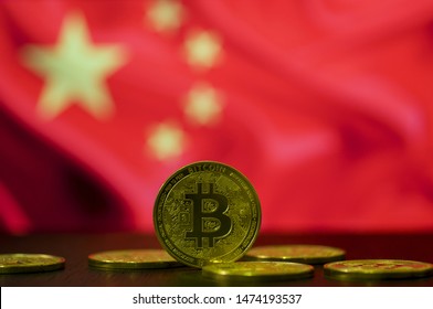 Bitcoin Golden Coin With China Flag In The Background