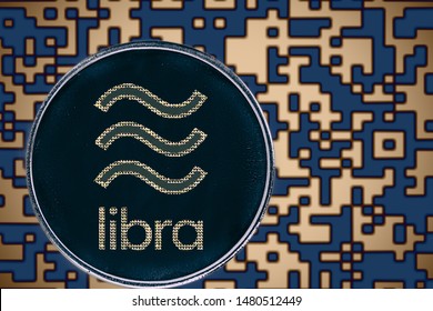 Bitcoin libra coin cryptocurrency on the background of crypto code