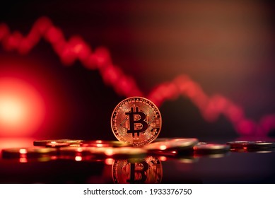 Bitcoin price crash in front of a red abstract virtual background - Shutterstock ID 1933376750