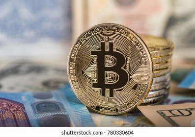 Bitcoin Virtual Currency. Trading with Bitcoin. The risk of buying a virtual currency. Crypto Currency background concept, various banknotes in the background