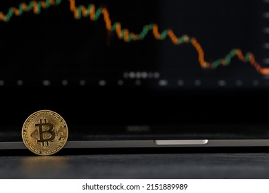 Bitcoins And New Virtual Money Concept. Gold Bitcoins With Candle Stick Graph Chart And Digital Background. Mining Or Block Chain Technology.