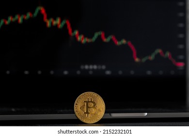 Bitcoins And New Virtual Money Concept. Gold Bitcoins With Candle Stick Graph Chart And Digital Background. Mining Or Block Chain Technology.