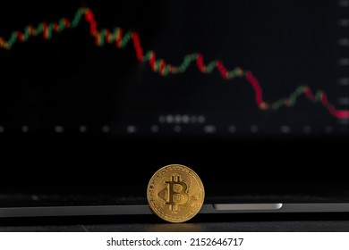 Bitcoins And New Virtual Money Concept. Gold Bitcoins With Candle Stick Graph Chart And Digital Background. Mining Or Block Chain Technology.