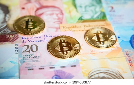 Bitcoins Over The Background Made Of Venezuela Currency