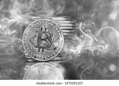 Bitcoins Stack With Smoke. Black And White Image. Cryptocurrency And Digital Currency Concept