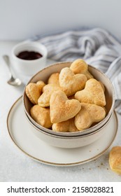 Bite food, puff pastry easy romantic breakfast idea, heart shaped bakes with chocolate dip on the table