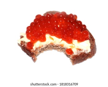 Bite Mark On The Surface Of A Sandwich Made Of Dark Bread And Red Caviar