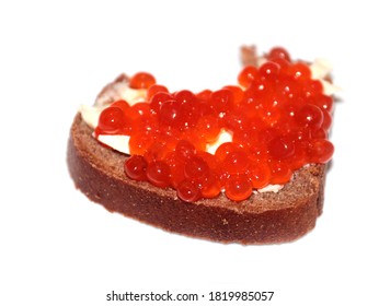 Bite Mark On The Surface Of A Sandwich Made Of Dark Bread And Red Caviar