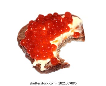 Bite Mark On The Surface Of A Sandwich Made Of Dark Bread And Red Caviar