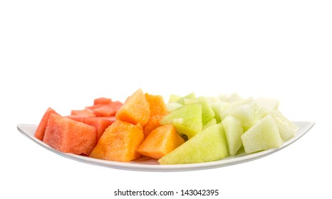 Bite Size Melons And Honeydews Over White Background