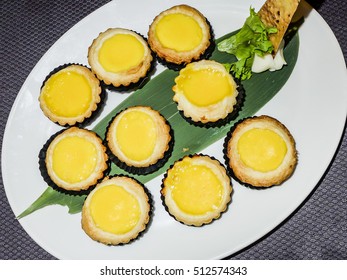 Bite size mini egg tart at an exclusive chinese restaurant / Egg tart / Rich and creamy,perfect dessert after a hearty and sumptuous meal with close family members