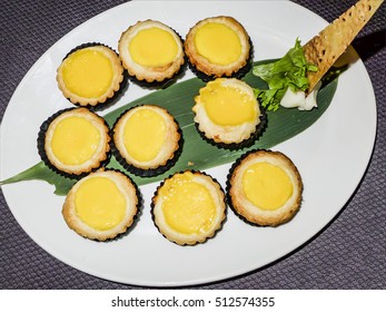 Bite size mini egg tart at an exclusive chinese restaurant / Egg tart / Rich and creamy,perfect dessert after a hearty and sumptuous meal with close family members
