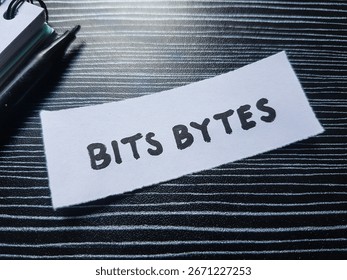 Bits bytes writting on table background. 