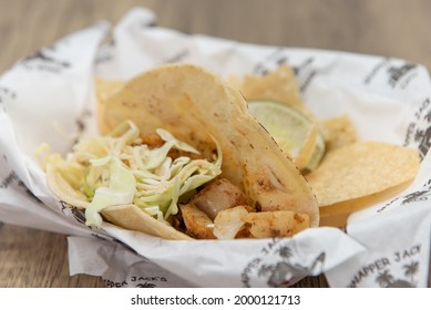 Bits And Pieces Of Fish Fillet Fills This Taco Along With The Cole Slaw.