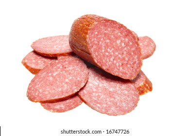 Bits Of Summer Sausage Isolated On White.