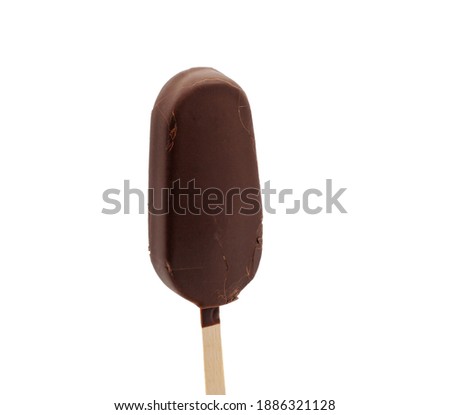 Bitten glazed ice cream on a stick.