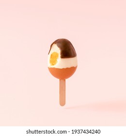 Bitten Ice Cream Made With Easter Egg And Chocolate On Popsicle. Creative Summer Or Spring Food Concept.