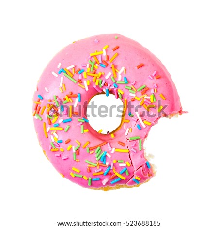 Bitten strawberry donut with colorful sprinkles isolated on white background. Top view.